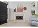 Elegant fireplace with decorative mantel and accents, complemented by large windows at 514 Augusta Dr, Canton, GA 30115