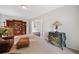 Cozy living room features a bookcase, decorative chest, and comfortable seating at 514 Augusta Dr, Canton, GA 30115