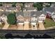Aerial shot showcases the attractive townhome exteriors and well-maintained community at 6004 Turfway Park Ct, Sugar Hill, GA 30518