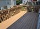 View of the spacious wooden back deck with railings, perfect for outdoor entertaining at 6004 Turfway Park Ct, Sugar Hill, GA 30518