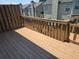 Spacious back deck with wooden railings, ideal for enjoying the outdoors and relaxation at 6004 Turfway Park Ct, Sugar Hill, GA 30518