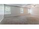 Spacious bedroom with ample natural light features a trey ceiling and plush carpeting at 7190 Cavender Sw Dr, Atlanta, GA 30331