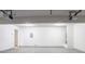 Clean and bright garage with two automatic garage door openers and overhead lighting at 7190 Cavender Sw Dr, Atlanta, GA 30331