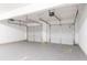 Spacious two car garage with automatic door openers and a sealed concrete floor at 7190 Cavender Sw Dr, Atlanta, GA 30331