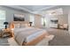 Staged main bedroom features neutral walls, plush carpet, and plenty of natural light at 7190 Cavender Sw Dr, Atlanta, GA 30331