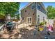 Backyard featuring a patio, grilling area, and space for recreation, perfect for Gathering gatherings at 130 Nacoochee Way, Canton, GA 30114