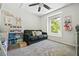 Bright and airy room featuring carpeted floors and a view to the outdoors at 130 Nacoochee Way, Canton, GA 30114
