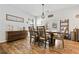 Dining area with hardwood floors, rustic wood table and decor, and french doors to outside at 130 Nacoochee Way, Canton, GA 30114