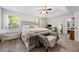 Bright, spacious bedroom with large windows, vaulted ceiling and ensuite access at 130 Nacoochee Way, Canton, GA 30114