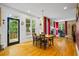 Dining area with access to deck, seamlessly connected to the kitchen and living room at 2700 Still Farms Ct, Lawrenceville, GA 30043