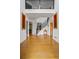 Grand foyer featuring hardwood floors, high ceilings, and an elegant staircase with metal railings at 2700 Still Farms Ct, Lawrenceville, GA 30043