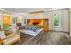 Spacious main bedroom features tray ceilings, natural light, and stylish decor at 2700 Still Farms Ct, Lawrenceville, GA 30043