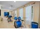 Bright music room with hardwood floors, curtains, and a complete drum set at 2700 Still Farms Ct, Lawrenceville, GA 30043