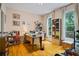 Bright home office with hardwood floors, natural light, and custom shelving, perfect for remote work at 2700 Still Farms Ct, Lawrenceville, GA 30043