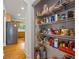 Walk-in pantry with metal racks, providing ample storage space for food and household items at 2700 Still Farms Ct, Lawrenceville, GA 30043