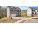 Attractive two-story home with a two-car garage and a well-kept front yard at 620 Lobelia Way, Locust Grove, GA 30248