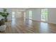 Bright and airy living room with hardwood floors, large windows, and contemporary decor at 3350 Pine Meadow Nw Rd, Atlanta, GA 30327