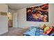 A bedroom features a colorful mural on the wall and playful decor, creating an imaginative and comfortable space for a  at 336 Freeman Cir, Villa Rica, GA 30180