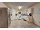 Well-lit kitchen with stainless steel appliances, white cabinets, and mosaic backsplash at 336 Freeman Cir, Villa Rica, GA 30180