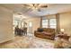 Open concept living and dining area with lots of natural light and comfortable seating at 336 Freeman Cir, Villa Rica, GA 30180