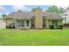 Inviting backyard with patio, offering a tranquil outdoor space with easy access to the house at 467 Ravinia Way, Lawrenceville, GA 30044