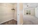 Bedroom with a walk-in closet, plush carpet and neutral walls at 467 Ravinia Way, Lawrenceville, GA 30044