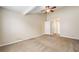 Large bedroom with carpeted floor, a ceiling fan, and ample natural light at 467 Ravinia Way, Lawrenceville, GA 30044