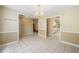 Elegant dining room featuring tiled floors, chandelier, and neutral paint scheme at 467 Ravinia Way, Lawrenceville, GA 30044