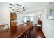Formal dining room featuring hardwood floors and a decorative chandelier at 5778 Little Oak Trl, Stone Mountain, GA 30087