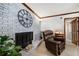 Cozy fireplace with brick surround and decorative mantel in a comfortable living space at 5778 Little Oak Trl, Stone Mountain, GA 30087