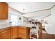 Kitchen with breakfast bar and pendant lighting, open to the living area at 5778 Little Oak Trl, Stone Mountain, GA 30087
