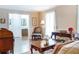 Comfortable living room with hardwood floors, neutral walls, and traditional decor at 5778 Little Oak Trl, Stone Mountain, GA 30087