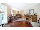Cozy living room with classic furnishings, hardwood floors, and an inviting atmosphere at 5778 Little Oak Trl, Stone Mountain, GA 30087