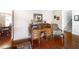 Charming home office with hardwood floors, vintage rolltop desk and traditional furnishings at 5778 Little Oak Trl, Stone Mountain, GA 30087