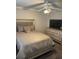 Bedroom with bed, TV, and ceiling fan at 2166 Lake Ridge Ter, Lawrenceville, GA 30043