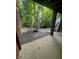 Outdoor patio area featuring a stone fire pit and wood-paneled privacy fence at 2166 Lake Ridge Ter, Lawrenceville, GA 30043
