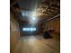 Spacious garage with a window and shelves with room for a workshop at 2166 Lake Ridge Ter, Lawrenceville, GA 30043