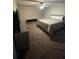 Relaxing main bedroom with neutral tones, a ceiling fan, and modern fixtures at 2166 Lake Ridge Ter, Lawrenceville, GA 30043