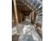 Covered outdoor patio with brick columns and access to the backyard at 2166 Lake Ridge Ter, Lawrenceville, GA 30043