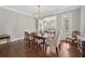 Dining room with hardwood floors and a view into other rooms at 4750 Freeport Bay Ne, Roswell, GA 30075