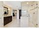 Luxurious bathroom featuring a stand-up shower with tiled walls at 4750 Freeport Bay Ne, Roswell, GA 30075