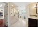 Spa-like bathroom boasts a soaking tub, walk-in shower and granite counters at 4750 Freeport Bay Ne, Roswell, GA 30075