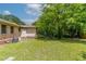 A sprawling backyard with a lush lawn and mature trees at 61 Springside Se Dr, Atlanta, GA 30354