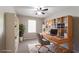 Comfortable home office setup with built-in shelving and a cozy rug at 61 Springside Se Dr, Atlanta, GA 30354