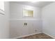 A clean laundry room provides a dedicated space for laundry tasks at 61 Springside Se Dr, Atlanta, GA 30354