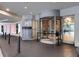 Building entrance with a revolving door, welcome sign, and decorative interior elements at 943 Peachtree Ne St # 1518, Atlanta, GA 30309