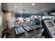 Gym featuring treadmills, a rowing machine, and televisions for entertainment during workouts at 943 Peachtree Ne St # 1518, Atlanta, GA 30309