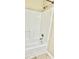 Bathroom features a white shower and tub combination with shower head at 186 Grapevine Dr, Douglasville, GA 30134