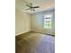 Bedroom with neutral carpet, ceiling fan, and window for natural light at 186 Grapevine Dr, Douglasville, GA 30134