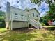 Charming two-story home with a front porch and stairs at 186 Grapevine Dr, Douglasville, GA 30134